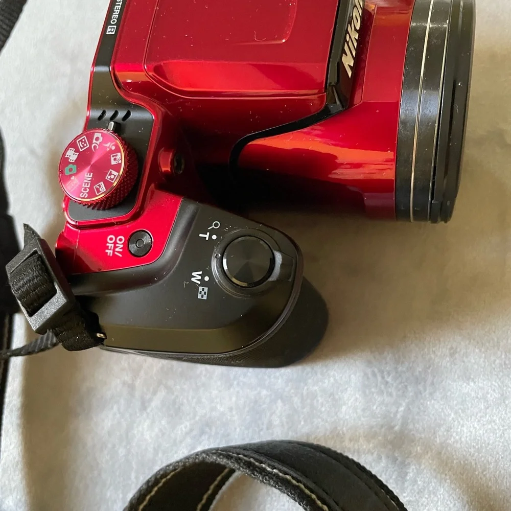 COPY - New Red Nikon camera with the bag.